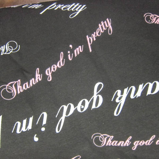 David and Goliath Thank God I'm Pretty on Black Cotton Jersey Fabric - Nature's Fabrics