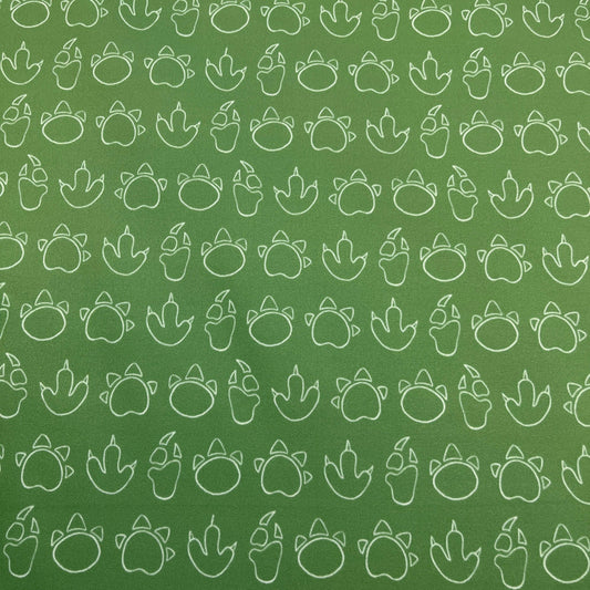 Dino Tracks on Green 1 mil PUL Fabric - Made in the USA - Nature's Fabrics