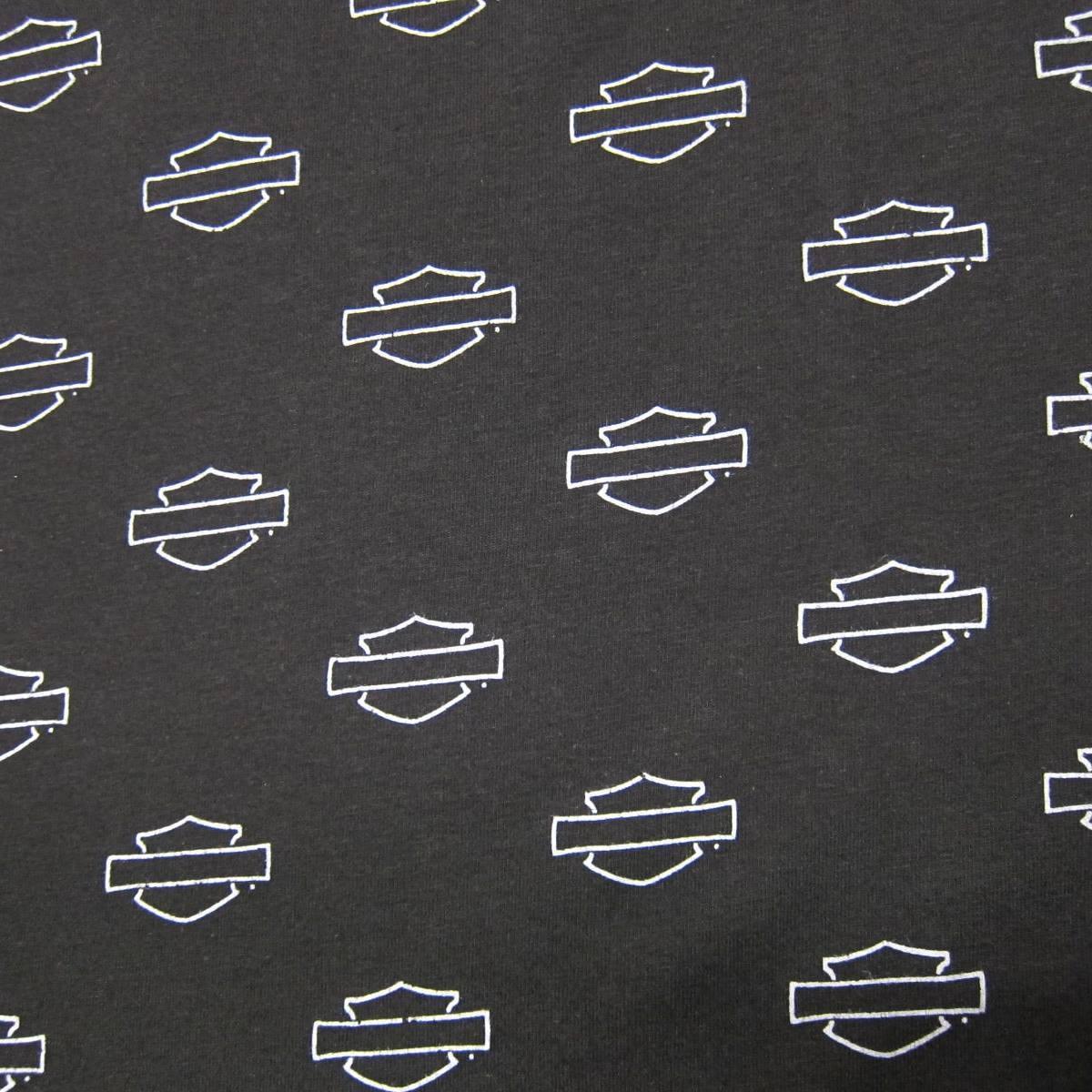 Emblems on Black Cotton/Spandex Jersey Fabric - Nature's Fabrics