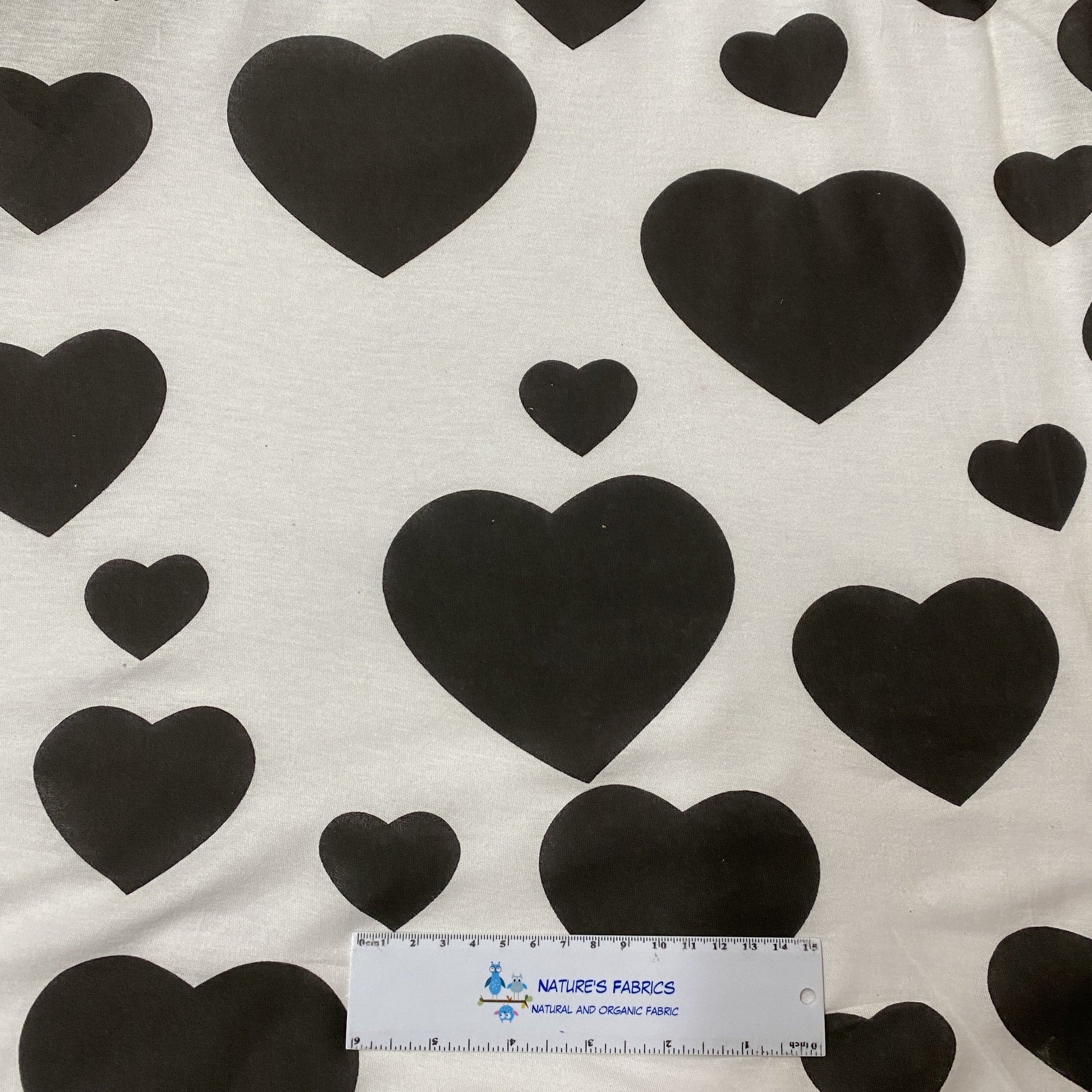Large Black Hearts on White Cotton Jersey Fabric - Nature's Fabrics