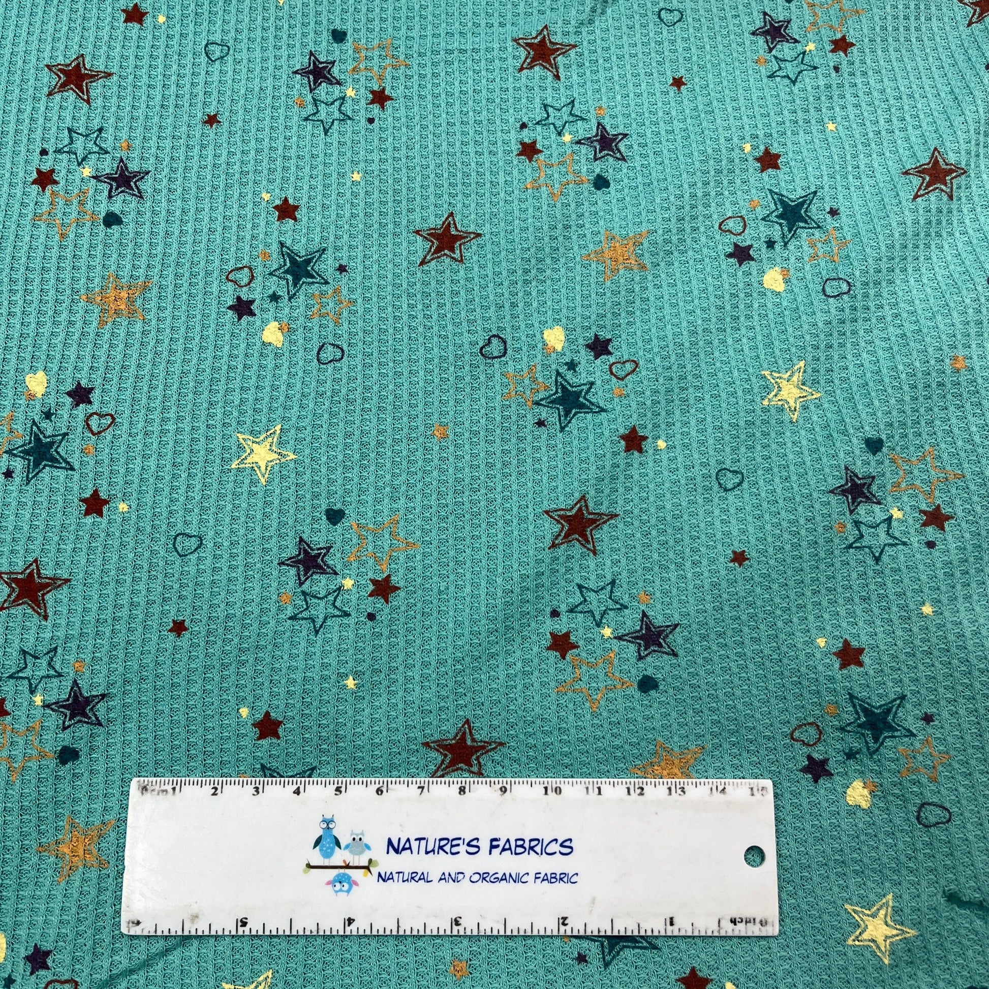 Multi Stars on Jade Cotton Thermal Fabric - Nature's Fabrics