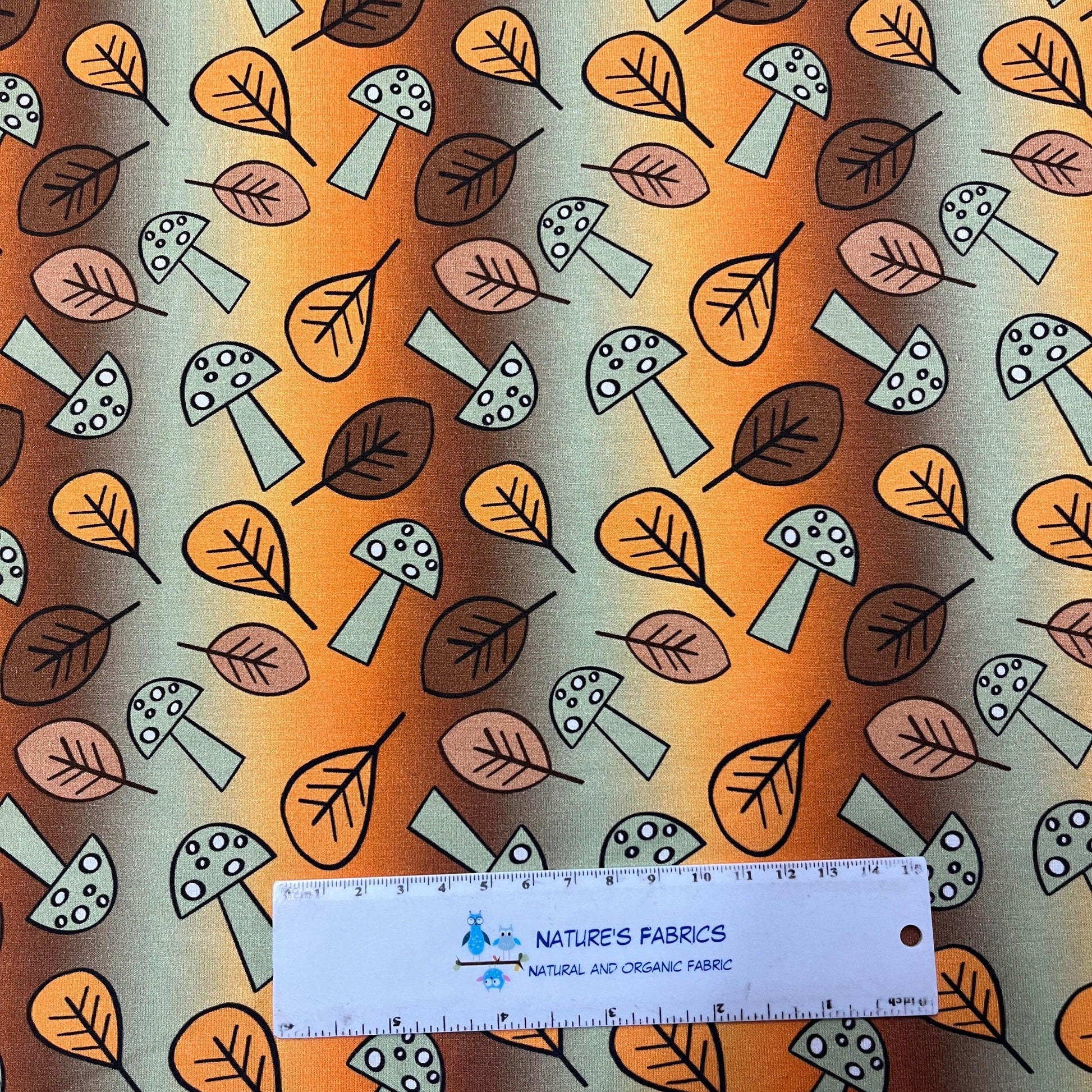 Mushrooms and Leaves on Bamboo/Spandex Jersey Fabric - Nature's Fabrics