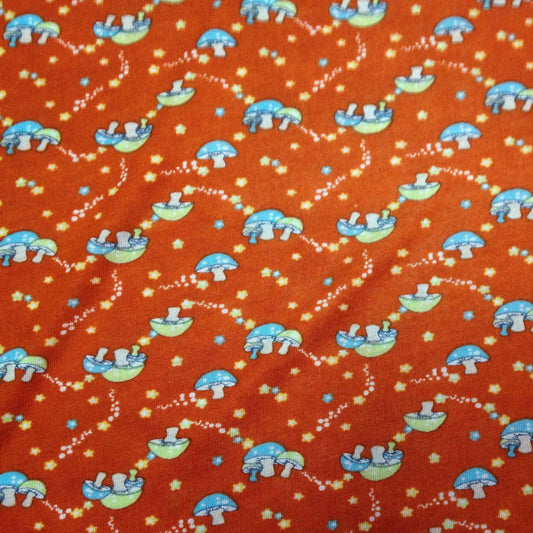 Mushrooms on Red Cotton/Poly Jersey