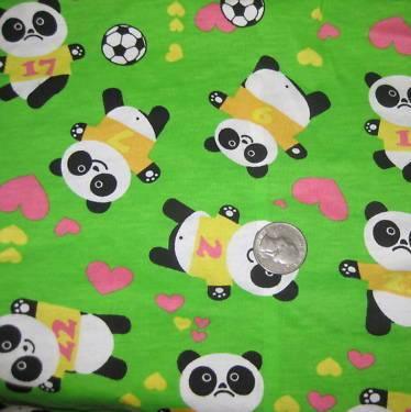 Panda Bears Love Soccer On Green Cotton Jersey Fabric - Nature's Fabrics