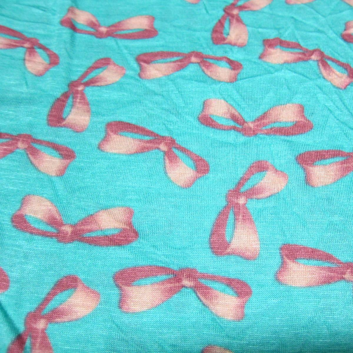 Pink Bows on Green Cotton/Poly Jersey