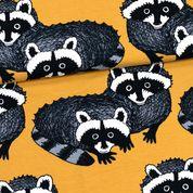 Raccoon on Ochre Organic Cotton/Spandex Jersey Fabric - Nature's Fabrics
