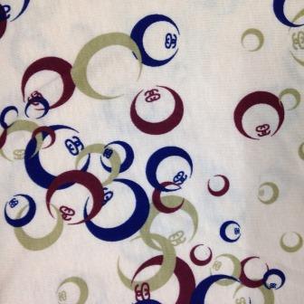 Red and Blue Circles on Peach Cotton Jersey Fabric - Nature's Fabrics