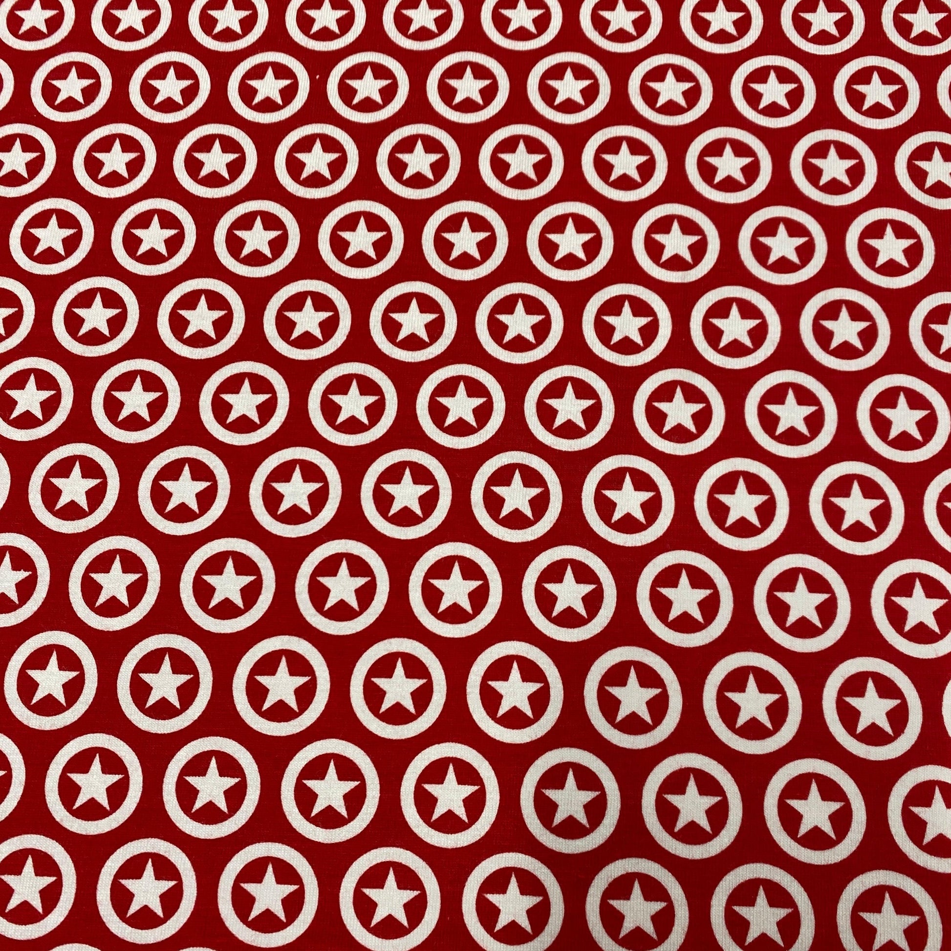 Star Circle on Cream Cotton/Spandex Jersey Fabric - Nature's Fabrics