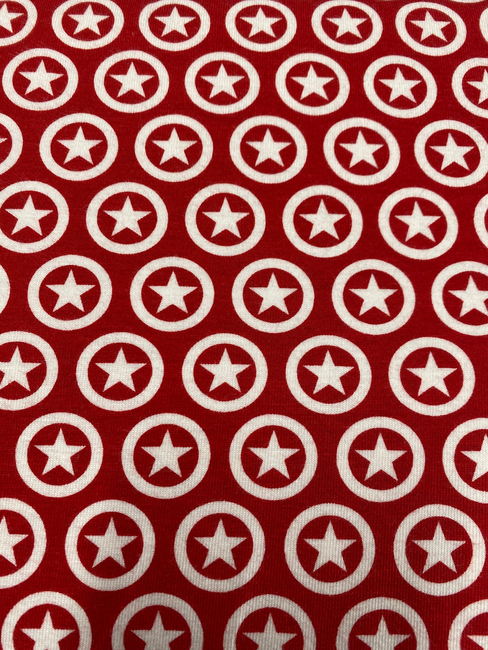 Star Circle on Cream Cotton/Spandex Jersey Fabric - Nature's Fabrics