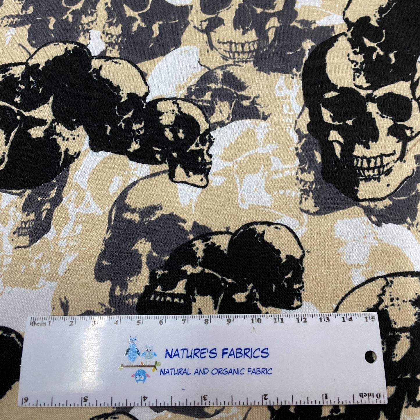 Tan and Black Skull Camouflage on Cotton/Spandex Jersey Fabric - Nature's Fabrics