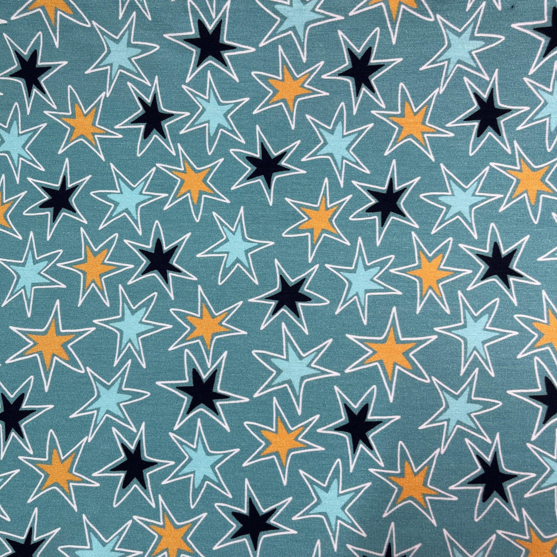 Texas Stars on Blue Bamboo/Spandex Jersey Fabric - Nature's Fabrics