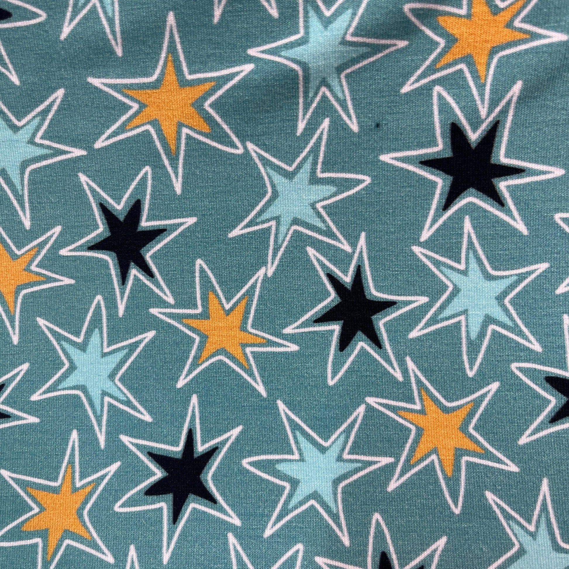 Texas Stars on Blue Bamboo/Spandex Jersey Fabric - Nature's Fabrics
