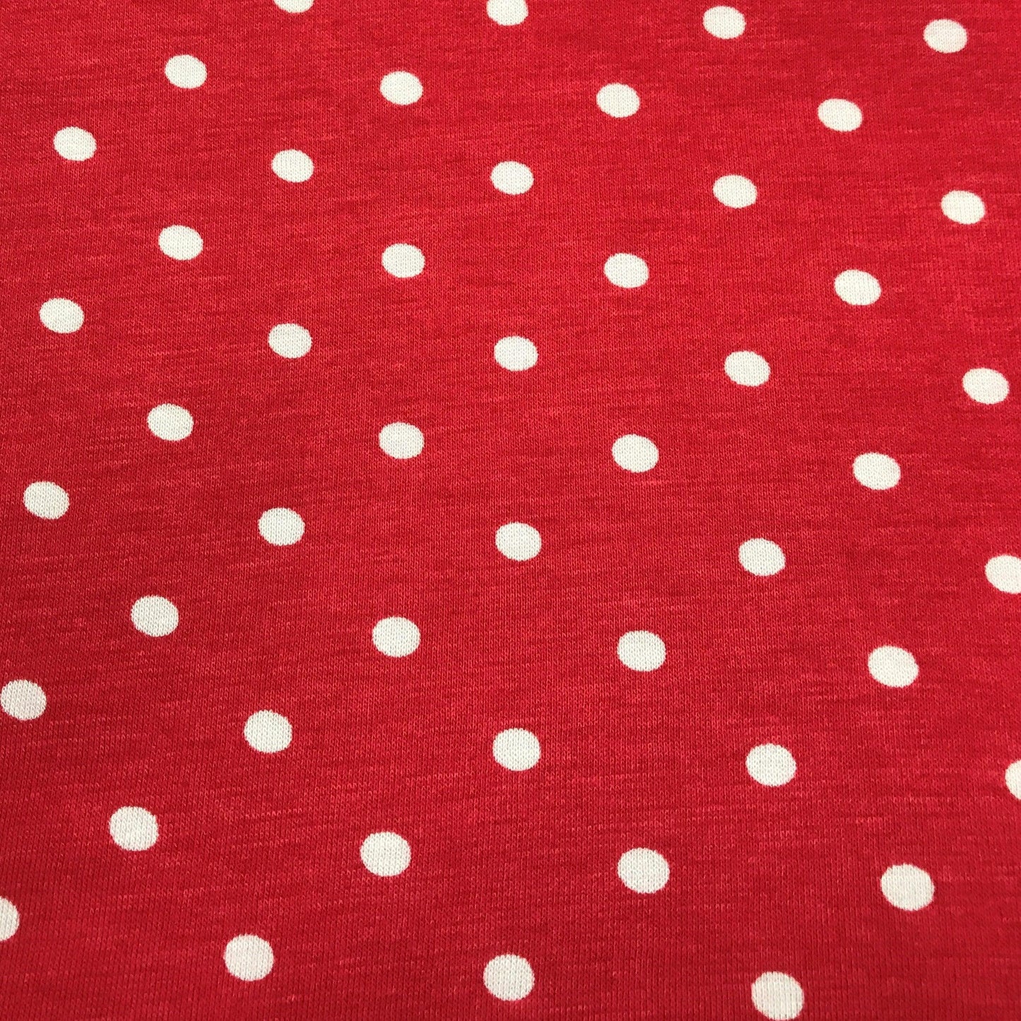 White 1/4" Dots on Red Cotton/Poly Jersey 