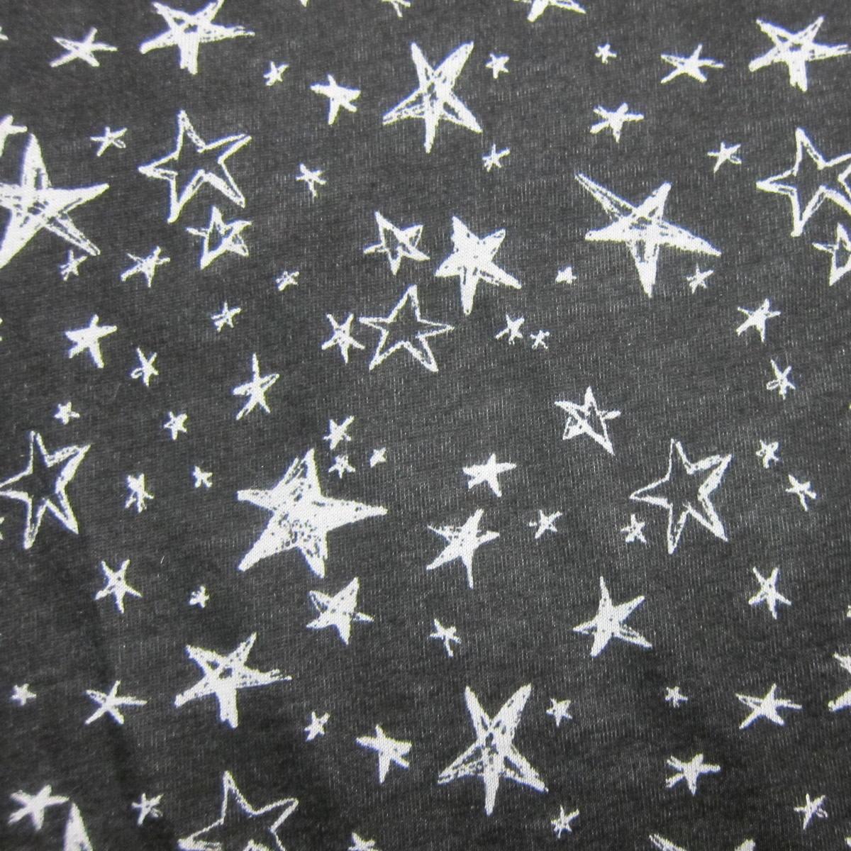 White Stars on Black Cotton/Poly Jersey Fabric - Nature's Fabrics