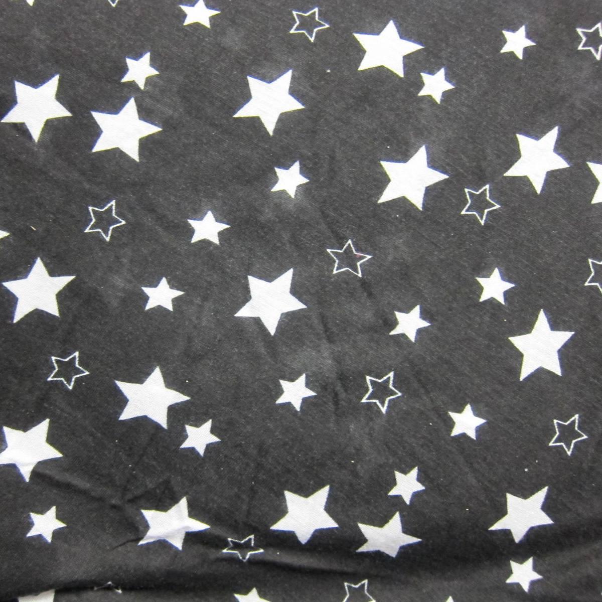 White Stars on Black Cotton/Poly Jersey Fabric - Nature's Fabrics