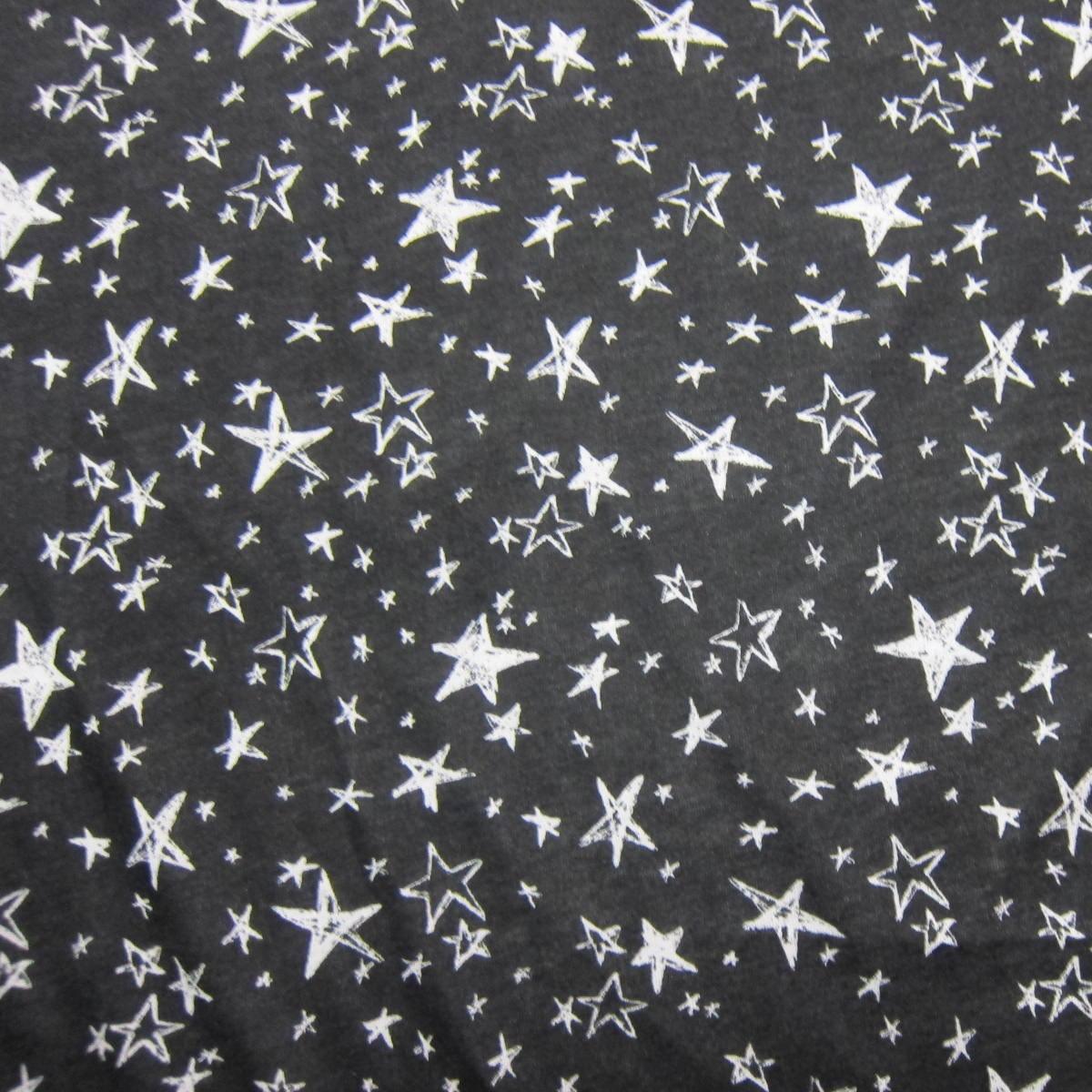 White Stars on Black Cotton/Poly Jersey Fabric - Nature's Fabrics