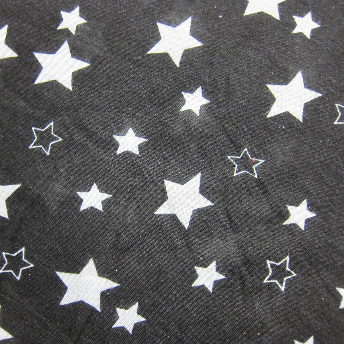 White Stars on Black Cotton/Poly Jersey Fabric - Nature's Fabrics